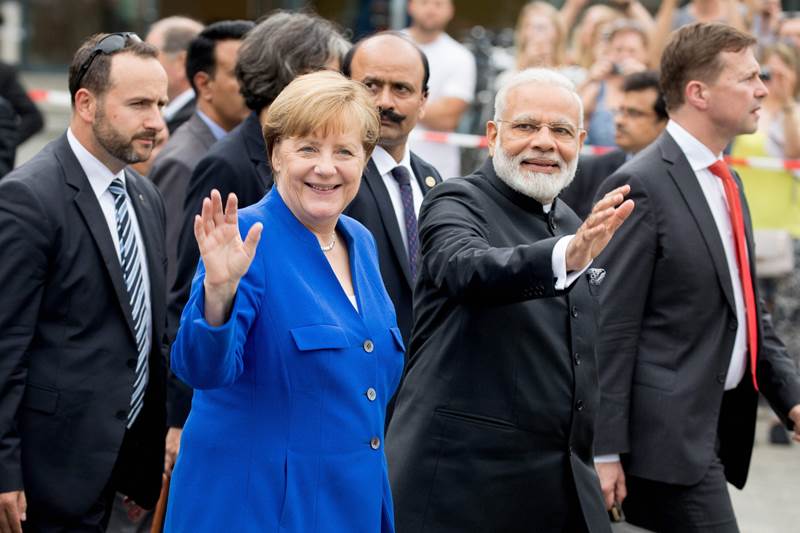 Narendra Modi, Narendra Modi visit to Germany, narendra modi in germany, Narendra Modi visit to Germany, narendra Modi, narendra Modi picture gallery, modi four nation tour, modi live, modi news, modi in germany, narendra modi news, modi images, modi germany images, modi merkel, modi russia, angela merkel, india news