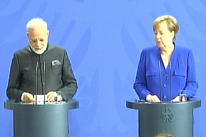 Narendra Modi, angela merkel, modi merkel joint statement, India, germany, india germany ties, india-germany, modi tour of germany, modi four nation tour