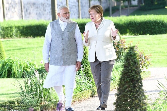 modi merkel meet, modi merkel meeting, narendra modi, angela merkel, india, germany, india germany relationship, germany india, modi in europe, modi germany