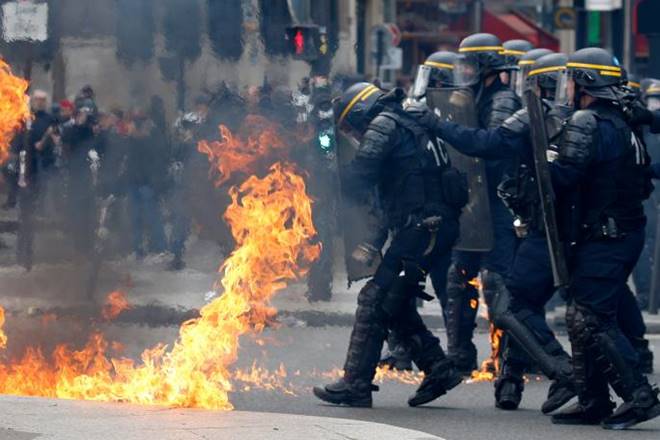 French trade unions clashed here during the annual May Day marches ahead of the upcoming second round of the French presidential elections. (Reuters) French trade unions clashed here during the annual May Day marches ahead of the upcoming second round of the French presidential elections. (Reuters)