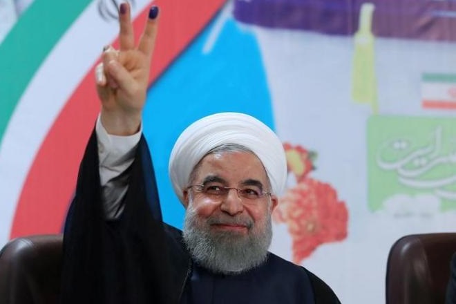 President Hassan Rouhani, who won re-election today, has spent three decades at the heart of Iran's revolutionary establishment but still faces opposition from hardliners for trying to rebuild ties with the West. (Reuters) President Hassan Rouhani, who won re-election today, has spent three decades at the heart of Iran's revolutionary establishment but still faces opposition from hardliners for trying to rebuild ties with the West. (Reuters)