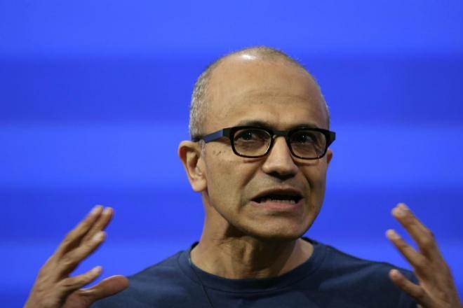 Nadella, the chief executive officer of Microsoft, also urged software developers to use technology to bring in "more and more people" within the global technological network. (Reuters)
