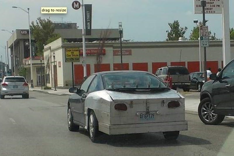 This car probably crashed and the boot was damaged, and the guy had to resort to a quick fix to transport very important cargo. Or he just has really bad taste.