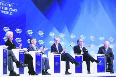 Global economic stalwarts at the 2017 World Economic Forum in Davos, Switzerland. These exclusive conferences in otherwise non-descript places are hard to enter and the purpose to be seen there is to network with the who’s who, the author says