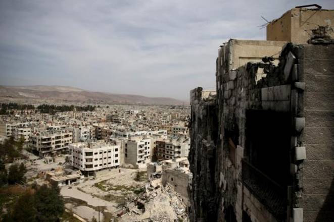 More than 2,200 civilians and rebels evacuated an opposition district in Damascus today, state media said, bringing the government closer to cementing its control over the Syrian capital. (Reuters) More than 2,200 civilians and rebels evacuated an opposition district in Damascus today, state media said, bringing the government closer to cementing its control over the Syrian capital. (Reuters)