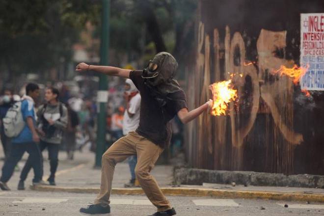 The death toll in Venezuela's six-week wave of anti-government unrest has risen to at least 42, according to the state prosecutor's office, which announced three deaths on Tuesday. (Reuters) The death toll in Venezuela's six-week wave of anti-government unrest has risen to at least 42, according to the state prosecutor's office, which announced three deaths on Tuesday. (Reuters)