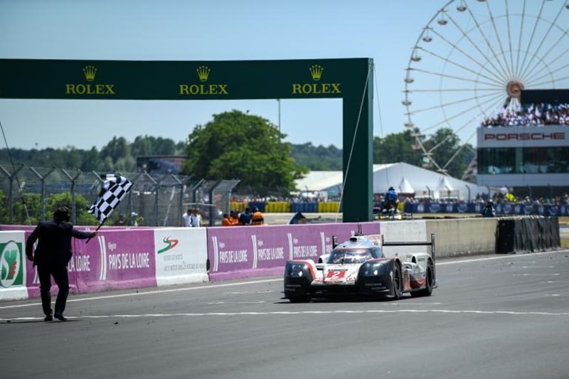 At the end of 24 hours, the number 02 Porsche 919 piloted by Timo Bernhard, Earl Bamber and Brendon Hartley takes the chequered flag and Porsche's 19th win at Le Mans.