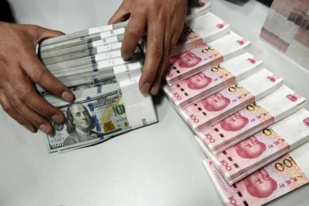 China’s yuan jumps to 30-week high, state banks buying