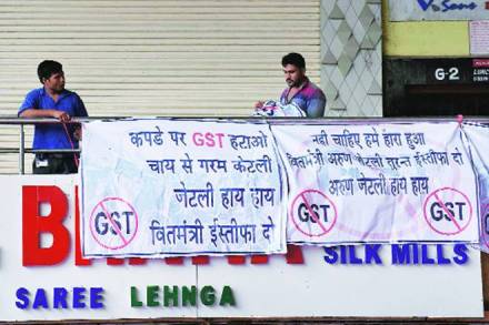 GST rollout, Goods and Services Tax, GST, tax, single tax, transactional value, commission, Clothes, natural fibers, silk sarees, sarees, Gold, GST Council, cigarettes, gst rate, gst rate on cigarettes, gst tax rate, gst rate on clothes