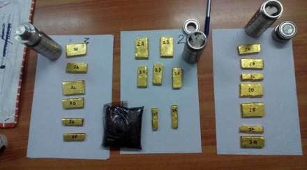 Gold holds near seven-month high as political worries buoy safe-haven demand