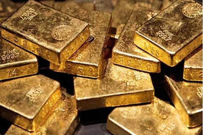 Gold slips; early UK poll results point to hung parliament