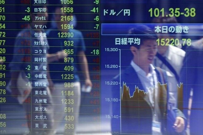 Japanese government bonds edge down slightly, taking cue from firmer stocks