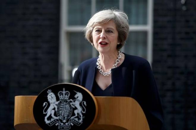 Britain, France, combat online extremism, Theresa May
