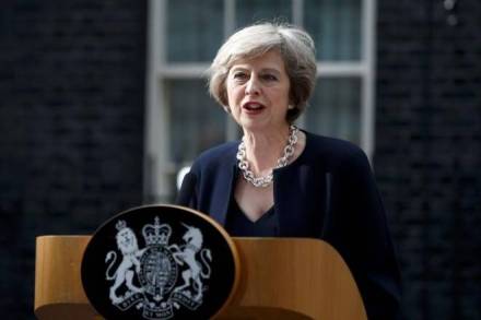 Britain, France, combat online extremism, Theresa May