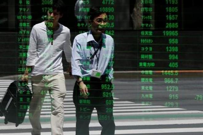 South Korean stocks hover near record high, won flat