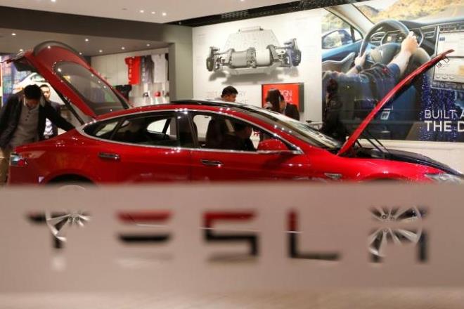 Tesla, Volvo, Elon Musk, Hakan Samuelsson,  Chinese-owned Volvo, Tesla's Model 3, battery-powered cars, European Union, German automaker