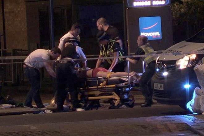 Police raided a building in east London that was the home address of one of the three attackers who killed seven people in the city centre, Sky News reported on Sunday, citing unnamed sources. (AP)