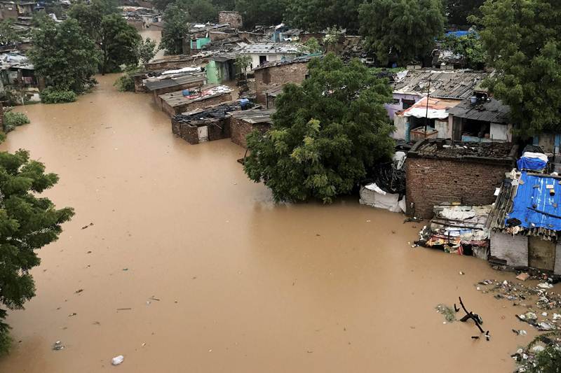 gujarat, Gujarat flood, gujarat monsoon, gujarat Sipu dam, gujarat deesa, gujarat heavy rains, gujarat Sabarmati River, Sabarmati River flood, Deesa Dhanera highway, Vasna Dam, Chandra Bhaga slum, ahmedabad, gujarat news