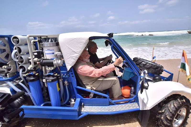 Narendra Modi in Israel, Narendra Modi in Haifi, Modi pics, Modi images, Gal-Mobile water desalination, Gal-Mobile water desalination technology, Narendra Modi at Olga Beach, Narendra Modi images, Narendra Modi pics, water purification, latest images, latest pics, Gal-Mobile images, Modi pics