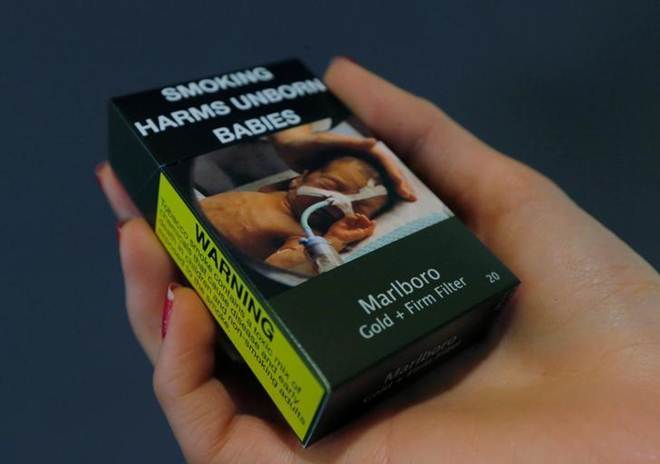 Delhi government, Philip Morris,Philip Morris International Inc, tobacco shops, remove all advertisements from tobacco shops, Marlboro cigarettes, promotional slogans, warns of legal action