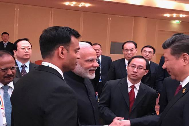 Narendra Modi, G20 Summit, PM, China President Xi Jinping meet in Hamburg, exchange warm handshake, BRICS