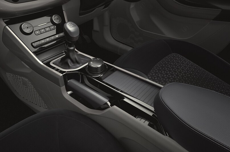 The centre console gets a folding tambour door that reflects a more premium class of vehicle.