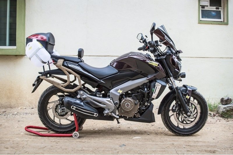 There's a distinct charm to riding to a destination, rather than flying to it or taking a train or even driving. A motorcycle allows you to be a part of scenery and the environment. Preparing your motorcycle for touring is fun as well as time taking and can be expensive too, unless you own a Triumph Tiger or a Ducati Multistrada. But, who says you need an expensive adventure tourer for grand touring? More and more riders in India are embracing long trips on their motorcycles. One such rider and enthusiast is Ashwin Ram, who has decided to help fellow riders prep their bikes and make them more touring friendly. We had a word with Ashwin to find out how to convert a Dominar 400 to look like an adventure tourer.