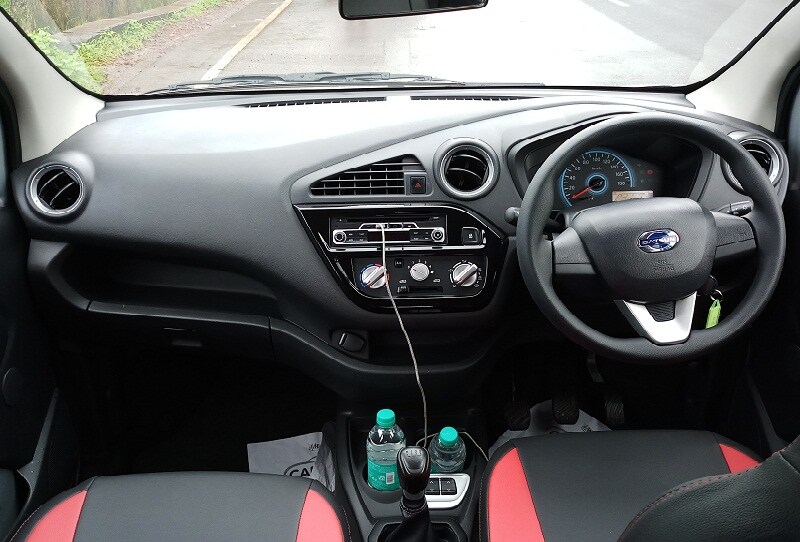 The air-conditioner vents and the horn pad have been given silver finish, which add a bit of a contrast to the otherwise blackened out interior. And to top it all, another little trinket that distinguishes the redi-GO 1.0L form the previous 0.8 L car is the '1.0' logo on the boot lid.