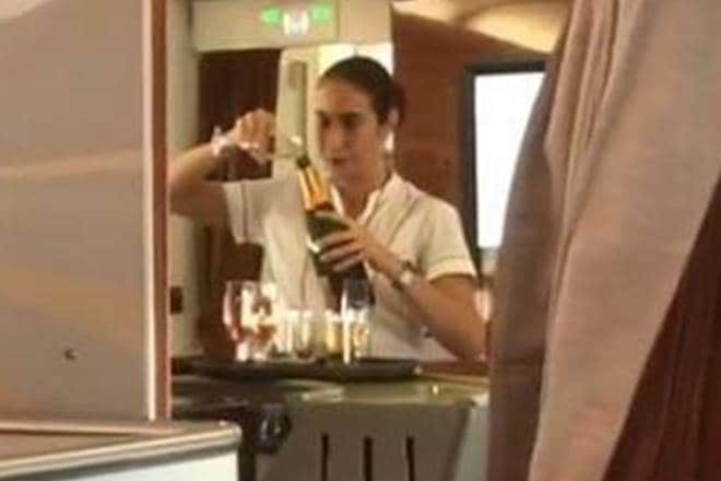 Emirates, flight attendant, air hostess, champagne, viral video Emirates, flight attendant, air hostess, champagne, viral video