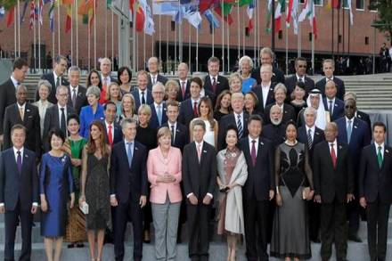 G20 summit, Vladimir Putin, Donald Trump, protest, US President, Russian President, world news, International news, Financial express G20 summit, Vladimir Putin, Donald Trump, protest, US President, Russian President, world news, International news, Financial express