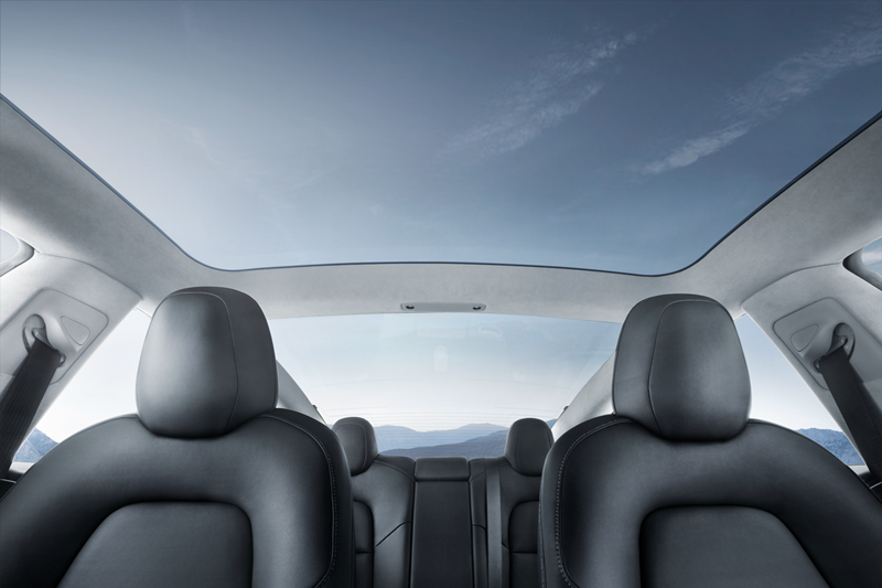 After the large digital screen, the most striking feature is the nearly all-glass roof that extends all the way back to the rear of the car. Tesla has said this is meant to help the relatively compact Model 3 look and feel bigger from the inside.