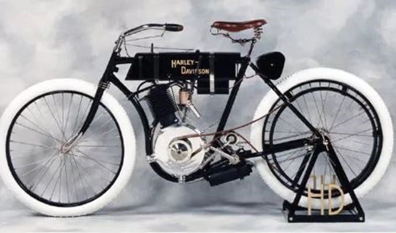 It was in the year 1901 William S. Harley finished the blueprint drawing of an engine that could fit on a bicycle. Harley, along with Arthur Davidson made the very first production Harley-Davidson motorcycle available to the public in 1903. It was built to be a racer. The factory in which the Serial Number One Bike was built was a 10*15-foot wooden shed with "Harley-Davidson Motor Company" crudely written on the door.