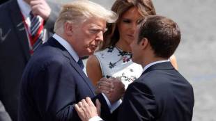 At a G20 summit last weekend, the two had another energetic tug-of-war, while their talks in Paris today finished with a 25-second powergrip in which neither man looked like they wanted to let go. (Reuters)