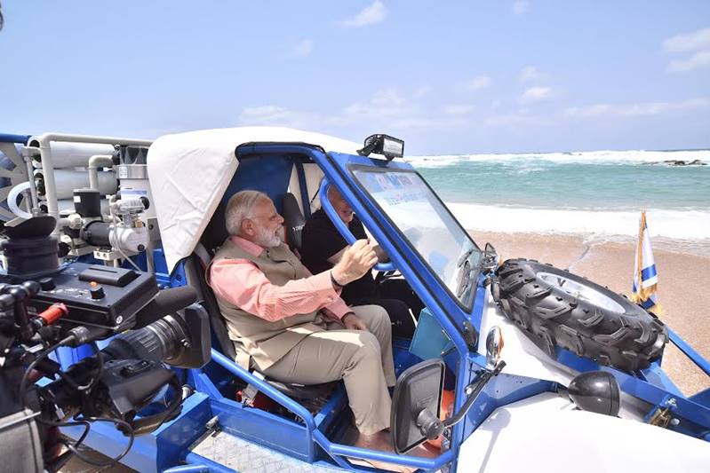 Narendra Modi in Israel, Narendra Modi in Haifi, Modi pics, Modi images, Gal-Mobile water desalination, Gal-Mobile water desalination technology, Narendra Modi at Olga Beach, Narendra Modi images, Narendra Modi pics, water purification, latest images, latest pics, Gal-Mobile images, Modi pics