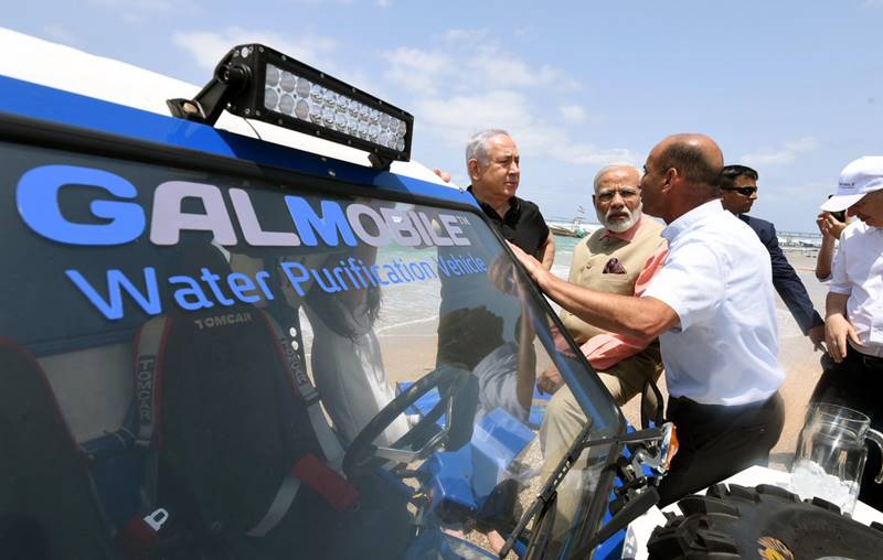 Narendra Modi in Israel, Narendra Modi in Haifi, Modi pics, Modi images, Gal-Mobile water desalination, Gal-Mobile water desalination technology, Narendra Modi at Olga Beach, Narendra Modi images, Narendra Modi pics, water purification, latest images, latest pics, Gal-Mobile images, Modi pics