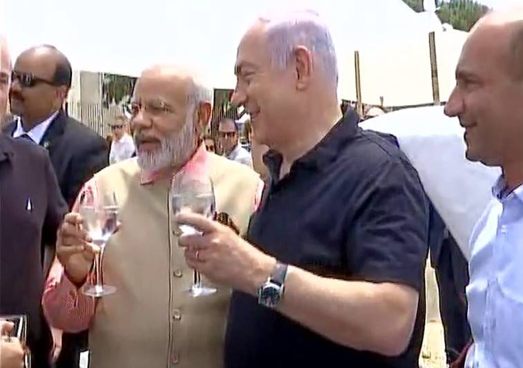 Narendra Modi in Israel, Narendra Modi in Haifi, Modi pics, Modi images, Gal-Mobile water desalination, Gal-Mobile water desalination technology, Narendra Modi at Olga Beach, Narendra Modi images, Narendra Modi pics, water purification, latest images, latest pics, Gal-Mobile images, Modi pics