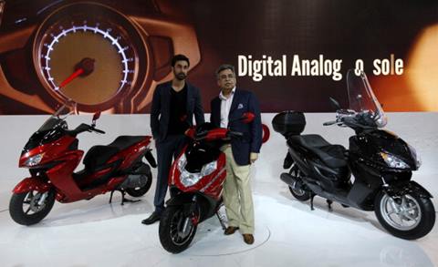 GREATER NOIDA, INDIA - FEBRUARY 6: Actor Ranbir Kapoor with Pawan Munjal, the Managing Director and CEO of Hero MotoCorp during the launch of two powerful and sleek looking scooters - the 150cc ZIR range, and the aggressively styled 125cc Dare at Hero Pavilion during the 12th Auto-Expo 2014 at India Expo Mart on February 6, 2014 in Greater Noida, India. (Photo by Raj K Raj /Hindustan Times via Getty Images)
