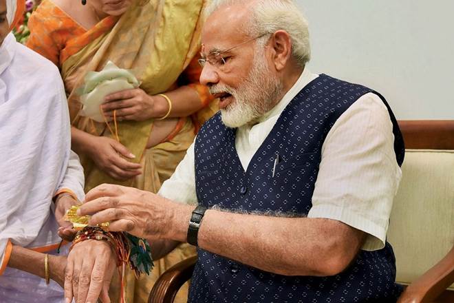 raksha bandhan 2017, raksha bandhan news, rakhi 2017, narendra modi, rakhi celebration, rakhi news, narendra modi rakhi celebrations, rakhi latest news, modi pakistani sister, pakistan rakhi sister, pm modi, pm modi rakhi, india, pakistan, india pakistan, financial express