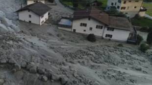landslide in Swiss Alps, massive landslide, mud, rocks and dirt flooding