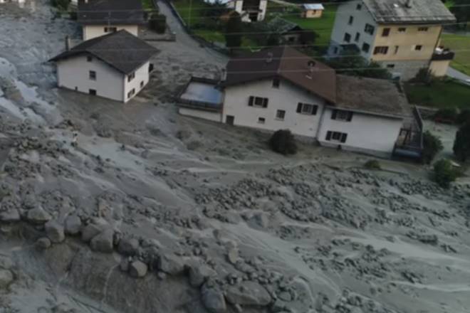 landslide in Swiss Alps, massive landslide, mud, rocks and dirt flooding