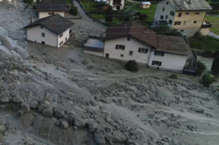 landslide in Swiss Alps, massive landslide, mud, rocks and dirt flooding landslide in Swiss Alps, massive landslide, mud, rocks and dirt flooding
