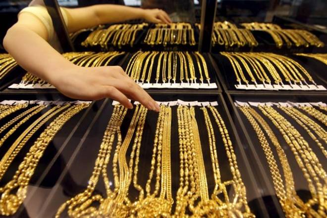 In international market, gold lost 0.23 per cent to USD 1,288.30 an ounce in Singapore. (Reuters) In international market, gold lost 0.23 per cent to USD 1,288.30 an ounce in Singapore. (Reuters)