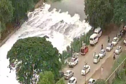 Bellandur lake, Bengaluru, polluted lake, smoke and flames, foam