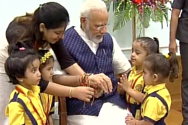 Modi Raksha Bandhan celebration, Raksha Bandhan 2017, PM Narendra Modi celebrates Raksha Bandhan, school children, widows of Vrindavan, Raksha Bandhan, india news