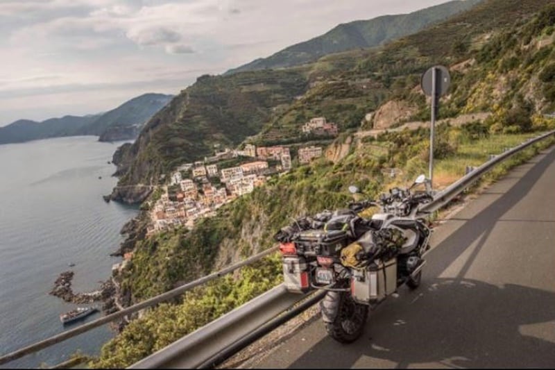 Parked against a beautiful backdrop of Italy's Cinque Terre coastline. The reason for choosing the GS for this trip, as Tim says, is that it is very reliable. This is his third GS, and Tim happens to have a done a combined 1,60,000 km of GS motorcycles without facing any major maintenance issues. Other than that, it is capable of off-roading quite well and munches miles quickly too.