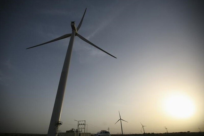 Power generating windmill turbines are pictured at Kalasar village in Gujarat May 6, 2012. REUTERS/Amit Dave/Files