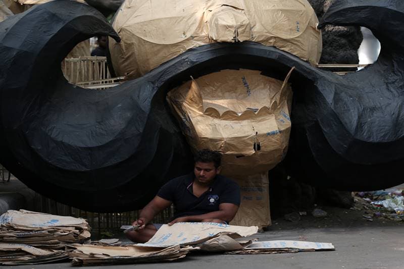 A craftsmen of creating Ravana effigies at Titarpur in West Delhi. (Express Photo By Amit Mehra)