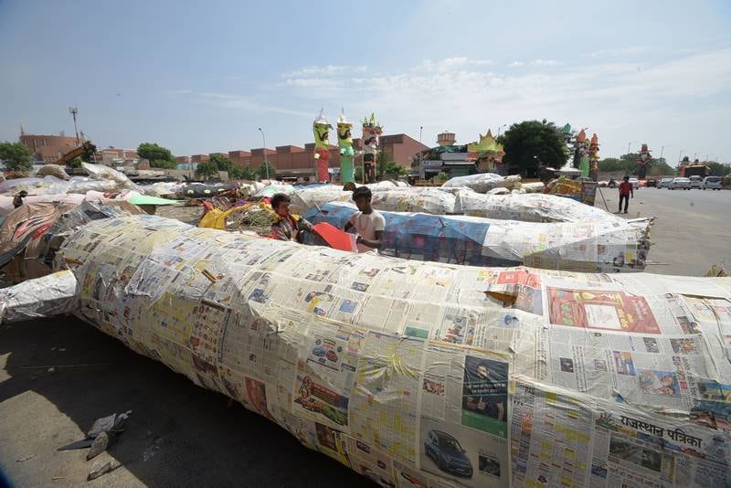Effigies of the demon king Ravana and his lieutenants take shape ahead of Dussehra Festival in Jaipur. (Express photo by Rohit Jain Paras)