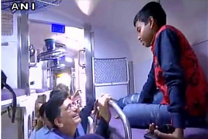 Mahamana Express is a weekly train which will run from Varanasi every Friday and from Vadodara every Wednesday. The train will be covering 1,531 km journey between two cities, at an average speed of 55.7 km/hr. (Railway Minister Piyush Goyal interacts with Mahamana Express train passengers.) (Image: ANI)