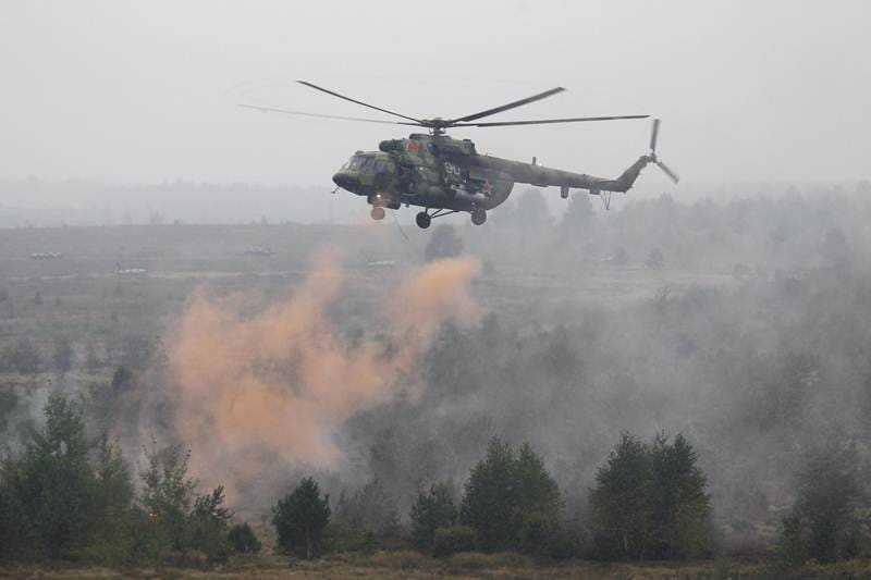 Zapad wargame 2017, Zapad wargame, Zapad, Russia war exercise, Zapad wargame 2017 pictures, Zapad wargame 2017 images, artillery firing at Zapad wargame, Belarus wargame, Belarus war machines, Russian weapons, Zapad 2017 drills, Russian military, Belarus military, war machines in zapad, Zapad images, Zapad picture gallery, Belarussian servicemen at zapad, Belarussian servicemen, Mi-8 helicopters, helicopters at zapad, Vladimir Putin